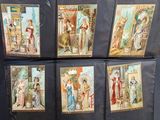 six cards with pictures of people on them on a table