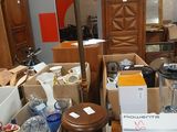 a lot of boxes and boxes on the floor in a room