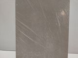 a picture of a white box on a white table