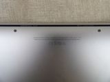 a close up of a laptop with a metal back panel