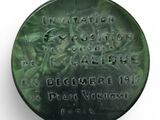 an image of a green plaque with writing on it