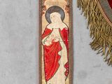 an image of a red and gold cross and a red and white banner
