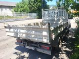 a truck that is parked on the side of the road