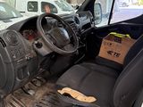 a car that is sitting in the back of a truck