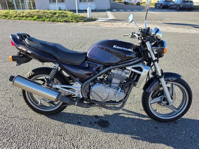 a motorcycle that is parked in the parking lot