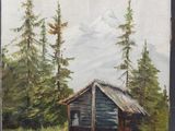 une peinture à l'huile représentant une cabane dans les bois, avec une montagne en arrière-plan