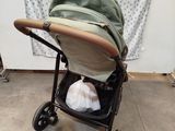a baby stroller that is sitting in a room