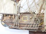 a model of a ship on display on a table
