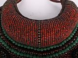 a close up of a necklace on a mannequin