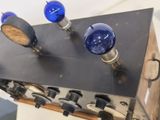 three blue lights that are sitting on top of a table