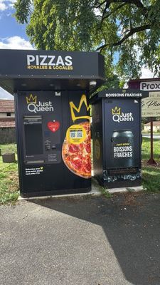 two vending machines that are on the side of the road
