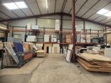 a large warehouse filled with lots of different types of furniture
