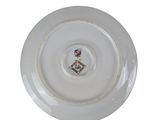 a white plate with a picture of a man on it