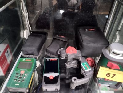 a display case filled with cell phones and other items