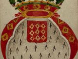 un vieux livre sur lequel figure l'image d'une couronne