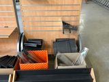a display case with many items in it on the floor