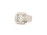 a white gold ring with a square diamond set in the center