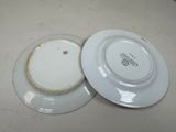 two plates that are sitting next to each other on a table