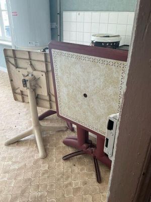 a small table in the corner of a room