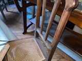 a chair that is sitting on the floor next to a table