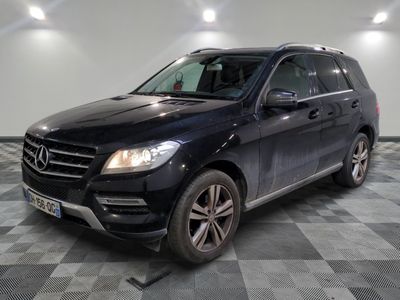 the mercedes gle is parked on a checkered tile floor
