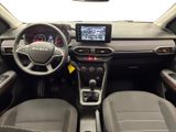 the interior of a car with a steering wheel, dashboard, and dash board