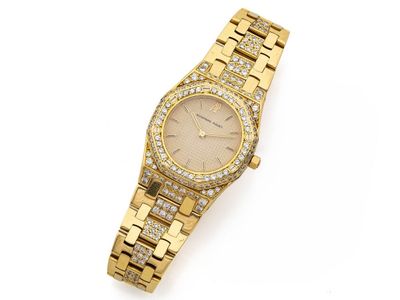 Montre Rolex pour femme avec bracelet en or 18 carats serti de diamants