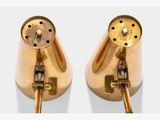 pair of brass table lamps on a white background