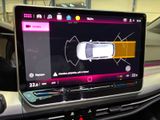 a picture of a car that is on display in a car showroom
