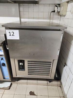 an image of a dirty kitchen with a dirty floor