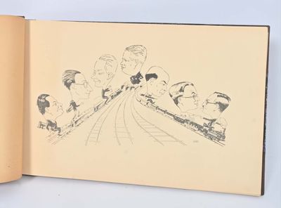 a book with a drawing of a group of people riding on a train