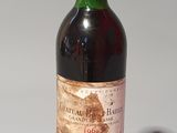 a bottle of wine that is sitting on a table