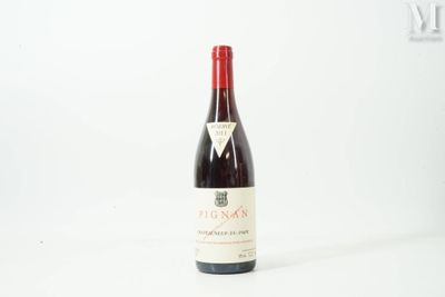 a bottle of wine that is sitting on a table