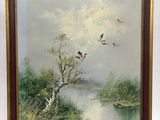 une peinture à l'huile représentant des oiseaux survolant une rivière dans un paysage
