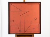 une image d'un tableau sur un chevalet dans une pièce