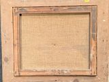 an image of a picture of a cat sitting on top of a wooden frame
