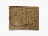 a piece of wood that is sitting on a white surface