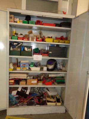 a closet with a lot of clutter in it
