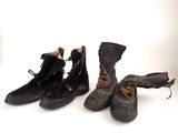 three pairs of shoes that are lined up on a white surface