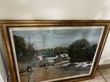 framed painting of a village scene with people walking down a road