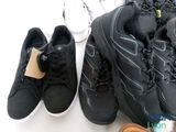 several pairs of shoes are lined up next to each other