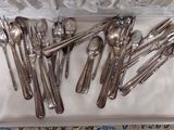 six spoons and two spoons in a box
