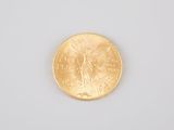 an image of a gold coin on a white surface