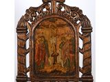 an old wooden frame with a painting of jesus on it