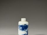 blue and white porcelain snuff bottle with clouds in the sky