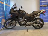 a motorcycle that is parked in a showroom