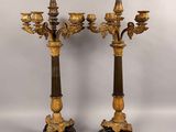a pair of antique bronze and marble candelabs