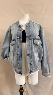 denim jacket on a mannequin dummy on a mannequin stand