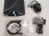 the contents of a nintendo wii game system are wrapped in plastic