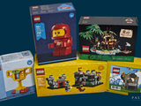 three boxes of legos that are sitting on a table